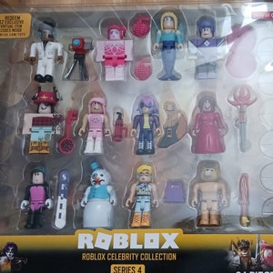 May include: A set of 12 Roblox Celebrity Collection Series 4 figures. The figures are in a clear plastic box with a yellow background. The figures include a variety of characters, including a snowman, a mermaid, a wizard, and a pirate. The box also includes 12 virtual item codes that can be redeemed online.