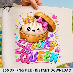 May include: A beige fabric item featuring a graphic of a cartoon dumpling in a bamboo steamer. The dumpling wears a gold crown and a pink bow. Below, the text reads Squishy QUEEN in colourful, bold letters, surrounded by hearts and stars.
