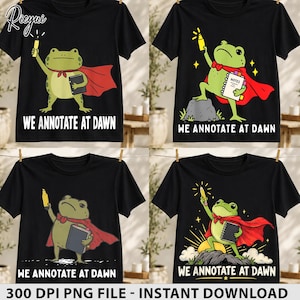 May include: A black t-shirt featuring a graphic of a green frog wearing a red cape, holding a yellow highlighter and a notebook, with the text "WE ANNOTATE AT DAWN" printed in white. The design depicts the frog in various poses and settings.