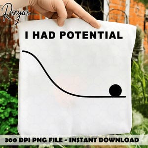 May include: White tote bag with the text "I HAD POTENTIAL" in black. A black line graphic depicts a ball rolling down a curve. The bag is held by a hand.