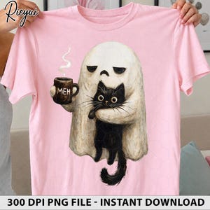 May include: A light pink short-sleeve t-shirt featuring a graphic of a white ghost with a bored expression holding a brown mug with the text MEH and a black cat. The ghost has a rounded shape and the cat has large eyes and long whiskers.
