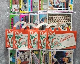 Paquetes navideños Topps vintage de 1965-1980, en perfecto estado, con sobres originales sellados y sin abrir. ¡Muchos posibles miembros del Salón de la Fama, como Mays, Ryan y más!