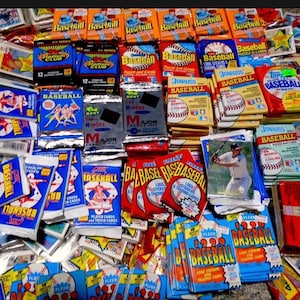 10 Vintage Factory Sealed packs of cards from the 1980’s & 1990’s. Rookies HOF Topps Upper Deck Leaf Fleer and more!