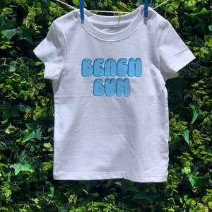 Beach Bum Onesie® and Toddler Tee
