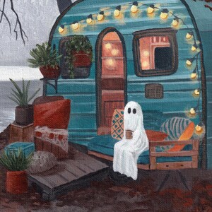 May include: A painting depicting a teal camper with a ghost figure seated on a bench, holding a mug. The camper features a wooden door, a window, and fairy lights. Potted plants and red cushions adorn the porch. The backdrop is a cloudy sky.