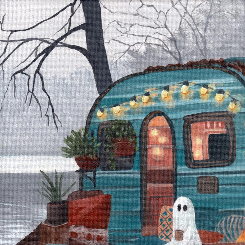 May include: A painting of a teal camper with fairy lights above the door. A small ghost figure is holding a mug. Potted plants and a red cushion are in front of the camper. Bare tree branches and a foggy background complete the scene.