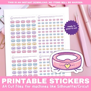 May include: Printable stickers featuring colorful ring designs and a pink robot vacuum cleaner illustration. The text reads "PRINTABLE STICKERS" and "A4 Cut Files for machines like Silhouette/Cricut". The stickers are ready to print and cut.