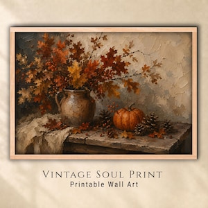 May include: A framed wall art print titled VINTAGE SOUL PRINT Printable Wall Art, featuring an oil painting of a ceramic pitcher filled with autumn leaves, a pumpkin, and pinecones resting on a weathered wooden table with a draped cloth.
