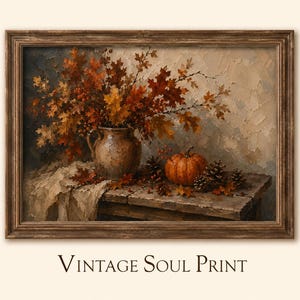 May include: A framed oil painting print titled Vintage Soul Print depicting a rustic still life scene with a ceramic pitcher filled with autumn leaves, a small orange pumpkin, and pinecones arranged on a weathered wooden table surface.