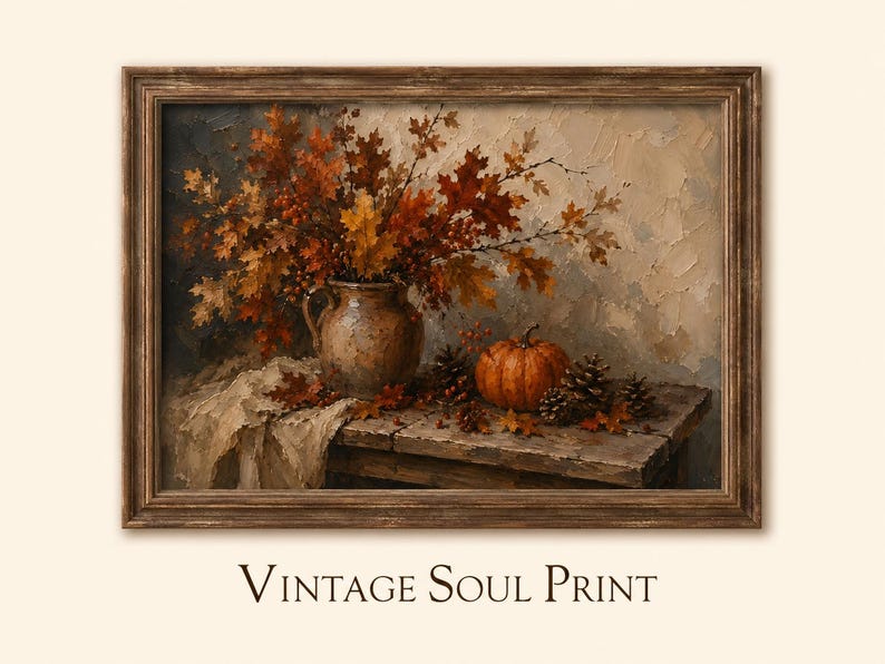 May include: A framed oil painting print titled Vintage Soul Print depicting a rustic still life scene with a ceramic pitcher filled with autumn leaves, a small orange pumpkin, and pinecones arranged on a weathered wooden table surface.