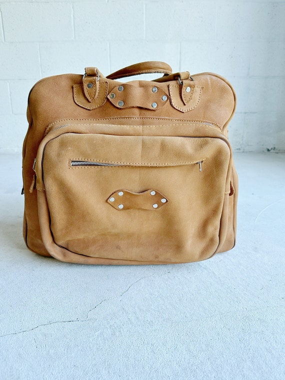 vintage 1960s leather duffle Gem