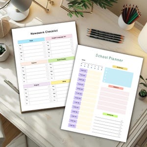 Two school planner pages displayed on a light wood desk, showing a colorful homework checklist page and a daily schedule page with time blocks, surrounded by pencils, a plant, and desk accessories.