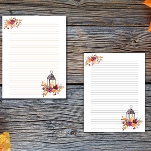 Fall stationery with lined pages featuring lantern and floral designs in warm autumn colors. Perfect for journaling, notes, or letters.