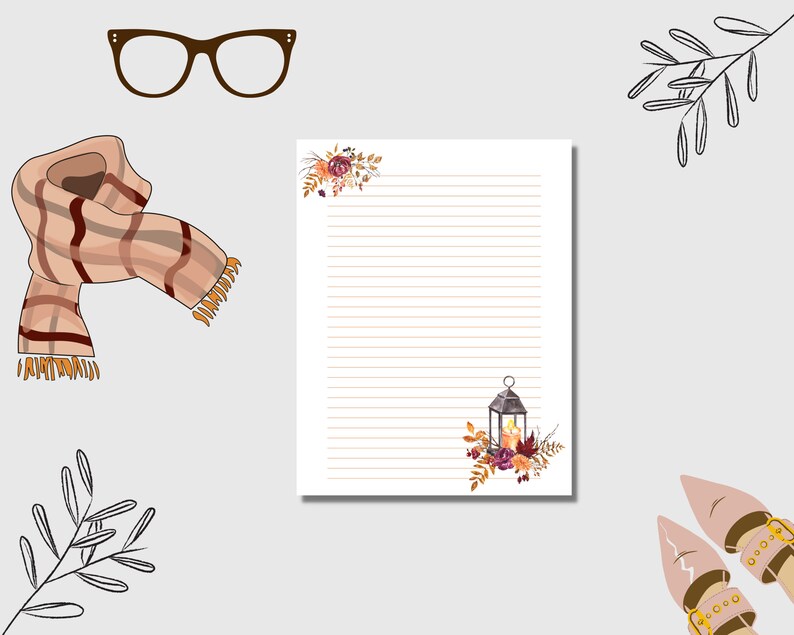 Fall lined stationery with lantern and floral design, autumn themed writing paper for Thanksgiving notes and cozy seasonal letters.