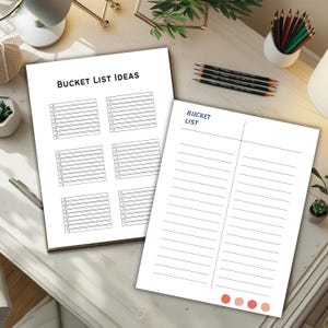 Two bucket list planner pages with checklist boxes and lined sections displayed on a light desk with pencils plants and office accessories.