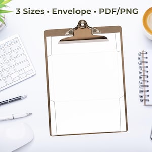 Envelope template sheet on a clipboard, displayed on a bright white desk with a keyboard, plant, coffee cup, notebook, pens, and a smartphone.