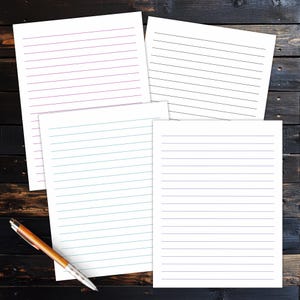 Four pastel lined note pages are arranged on a dark wooden desk with a pen placed near the sheets.