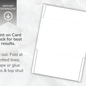 Envelope template sheet shown on a marble surface with printed cutting and folding guides and instructional text for how to assemble the envelope.