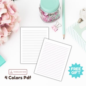 Flatlay of two lined stationery pages with black and purple rule lines on white paper.