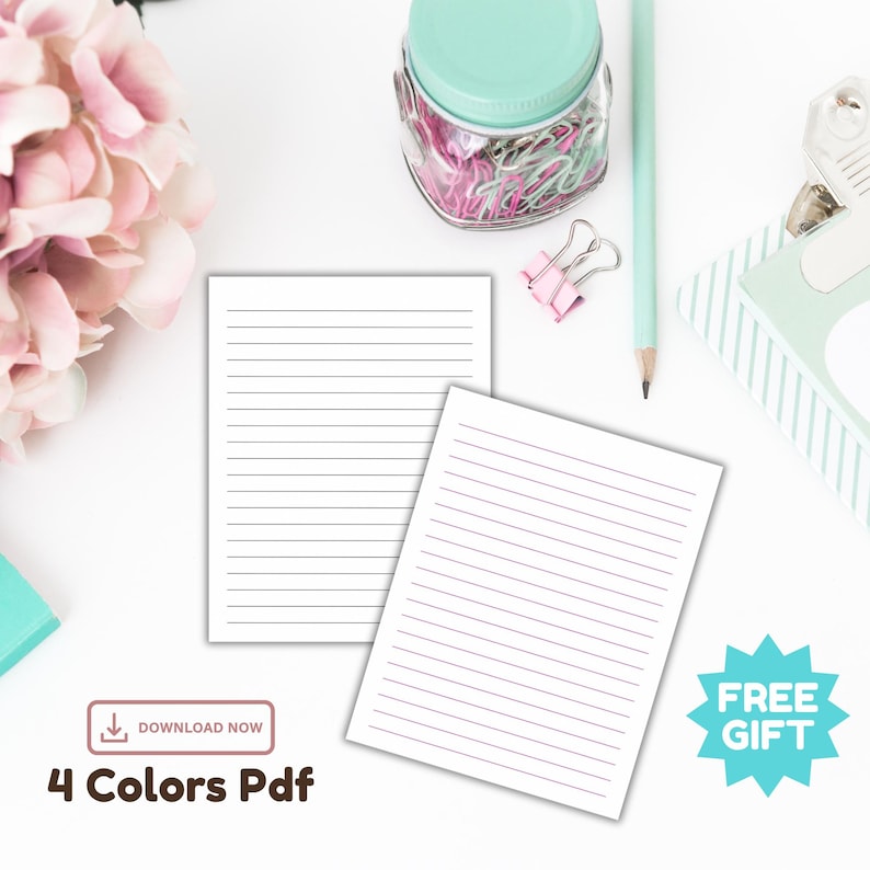Flatlay of two lined stationery pages with black and purple rule lines on white paper.