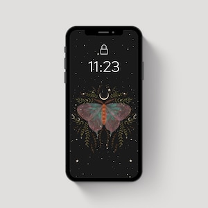 May include: A black smartphone screen with a dark background and a stylized illustration of a butterfly with a crescent moon and stars. The time 11:23 is displayed on the screen.