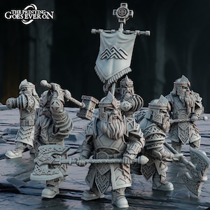 May include: A collection of grey dwarf figurines, each with distinct armour and weapons such as axes and hammers, and a banner displaying a mountain design. The text "THE PRINTING GOES EVER ON" is visible in the upper left corner.