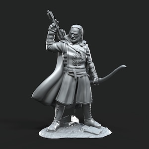 May include: A grey plastic miniature figurine of a person wearing a long coat and holding a bow and arrow. The figurine is standing on a base.