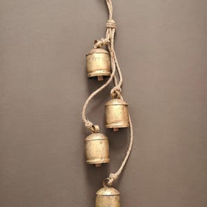 Rustic iron bells. Set of 4 heavy Rustic Hanging  garden cowbells