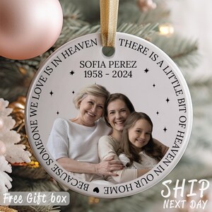 May include: White ceramic Christmas ornament with a photo of three women and the text "Because someone we love is in heaven, our home is a little bit of heaven in there. Sofia Perez 1958-2024"