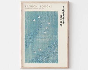 May include: A vintage woodblock print by Taguchi Tomoki, depicting a blue and white scene of swans flying over a body of water. The print is titled "Swan Woodblock Print 1360-1859" and includes Japanese text.