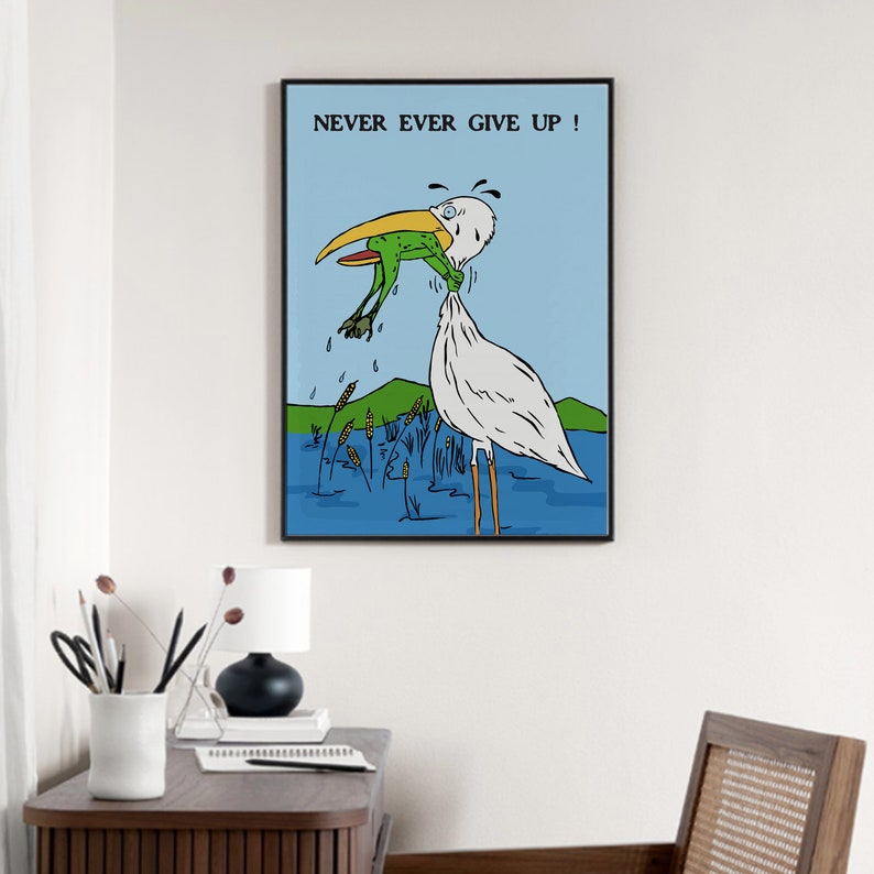 May include: A white bird with a long beak is holding a green frog in its beak. The bird is standing in a blue body of water with green reeds. The text "NEVER EVER GIVE UP!" is written in black at the top of the image.