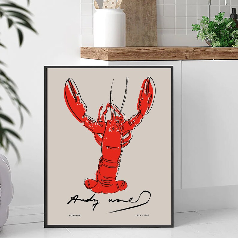 May include: A black and white line drawing of a red lobster with Andy Warhol's signature and the text "LOBSTER 1928 - 1987".