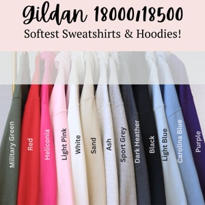 May include: A selection of Gildan 18000/18500 sweatshirts and hoodies in various colors, including military green, red, heliconia, light pink, white, sand, ash, sport grey, dark heather, black, light blue, Carolina blue, and purple.