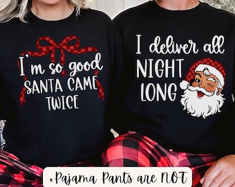 May include: Black sweatshirts with white text and red accents. One says "I'm so good SANTA CAME TWICE" with a red bow design. The other says "I deliver all NIGHT LONG" with a Santa graphic. Red and black plaid pajama pants are visible.