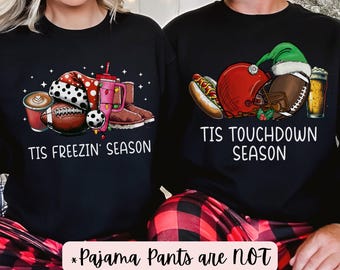 May include: Matching Christmas pajamas for couples. The woman's shirt says "Tis Freezin' Season" and features a snowman, a football, and a coffee cup. The man's shirt says "Tis Touchdown Season" and features a football, a hot dog, and a beer.