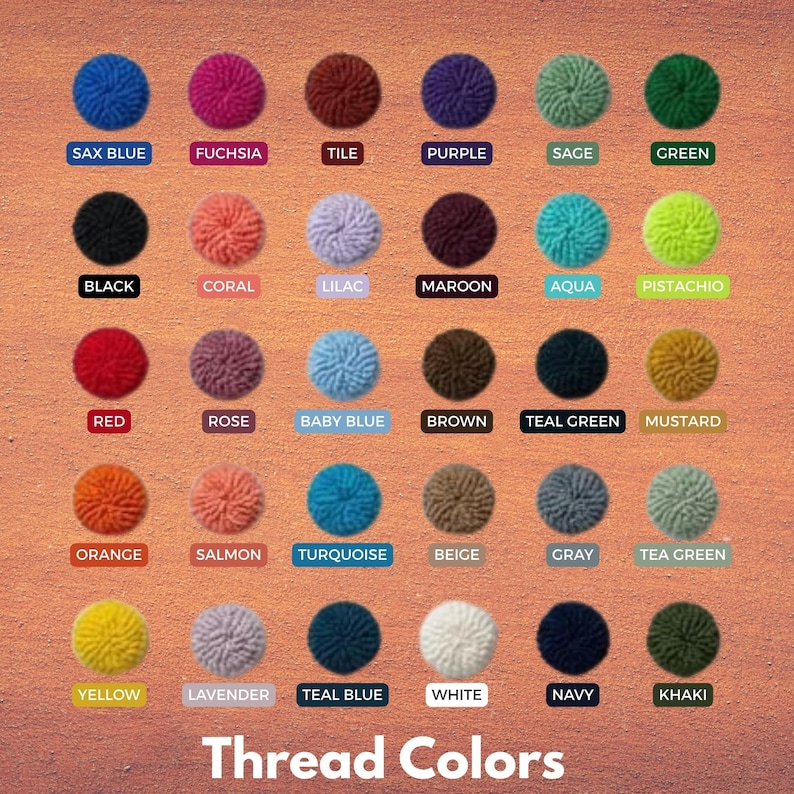 May include: A color chart of thread colors, featuring a grid of yarn pom-poms in various shades. Each pom-pom is labeled with its corresponding color name, such as "Sax Blue," "Fuchsia," and "Teal Green." The text "Thread Colors" is at the bottom.