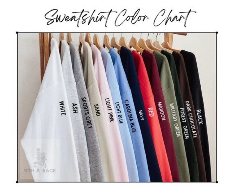 May include: Colour chart displaying 12 different sweatshirt colours, including black, dark chocolate, forest green, military green, maroon, red, navy, Carolina blue, light blue, light pink, sand, sports grey, ash, and white.