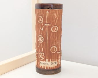 Vintage Brown Ceramic Samurai Grog Tiki Mug with Swords and Symbols