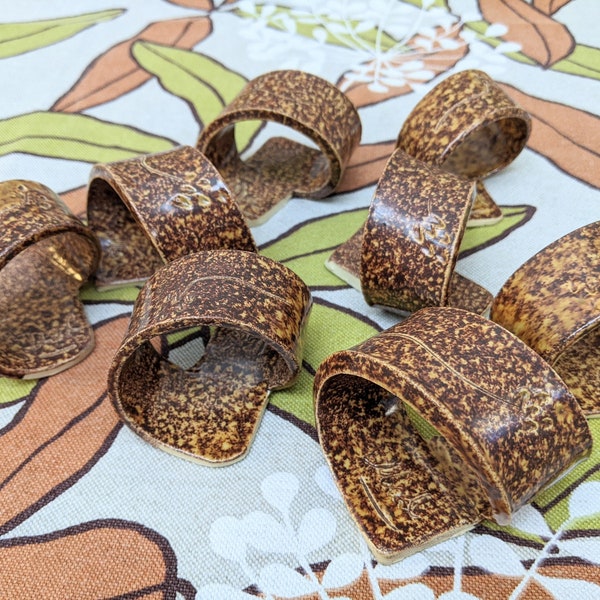 Set of eight (8) Vintage Hand Made Brown Ceramic Loop Napkin Rings