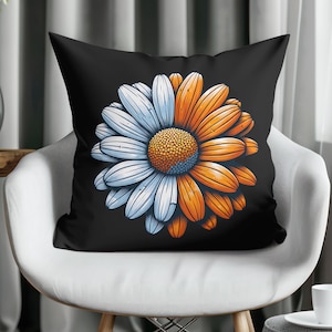 May include: Black throw pillow with a white and orange daisy flower design.