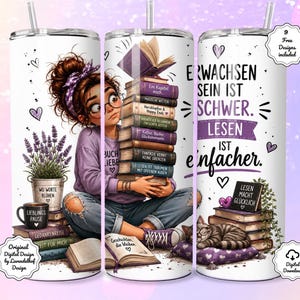 May include: A cylindrical tumbler featuring a cartoon illustration of a person with a messy bun and glasses holding a stack of books. The design includes lavender, a cat, and German text reading "ERWACHSEN SEIN IST SCHWER. LESEN IST einfacher."