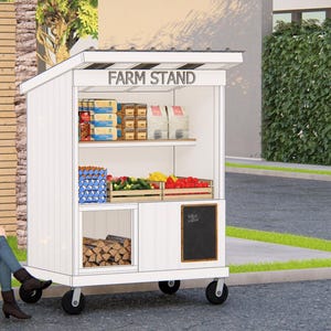 May include: A white farm stand on wheels with the text "FARM STAND" on top. The stand displays various products, including eggs, produce, and packaged goods. A person sits on a chair next to the stand.