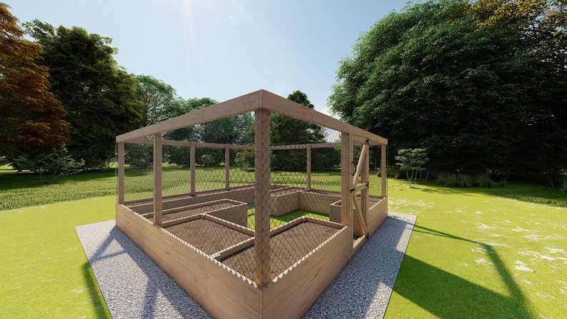 May include: A wooden raised garden bed with a wire mesh enclosure. The bed is divided into multiple sections and is surrounded by green grass.