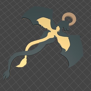 Puede incluir: Un amuleto de silueta de dragón dorado y negro con un halo sobre su cabeza. El amuleto está hecho de metal y tiene un diseño detallado.