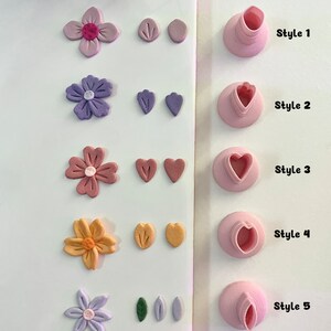 May include: Five different styles of polymer clay earrings with flower and leaf designs. The earrings are displayed on a white surface with the text "Style 1", "Style 2", "Style 3", "Style 4", and "Style 5" next to each style.