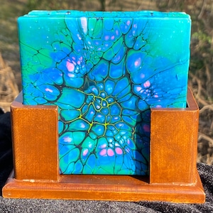 4 decorative ceramic tile coasters with wooden holder