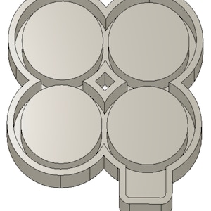 May include: A light gray, four-sectioned tray with rounded compartments. The tray has a clover-like shape with a small rectangular extension on one side. Each section is circular, designed to hold round objects.