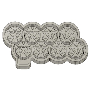 May include: A grey silicone mould with eight circular cavities, each featuring a five-pointed star design. The mould is designed for creating resin crafts.