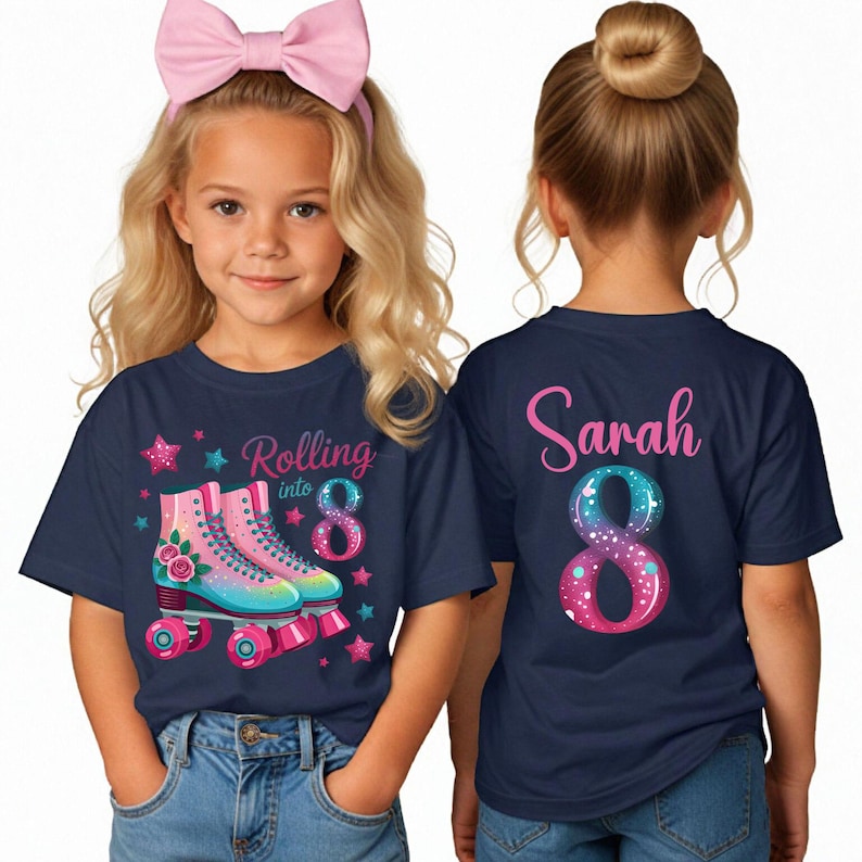 May include: Navy blue t-shirt featuring a roller skate design and the text "Rolling into 8". The graphic shows pink and blue roller skates with roses and stars. The back of the shirt says "Sarah" and the number 8.