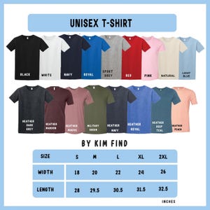 May include: A display of various unisex t-shirts in multiple colors, including black, white, navy, and red. The image also shows size and measurement details in inches, with widths ranging from 18 to 26 inches and lengths from 28 to 32.5 inches.